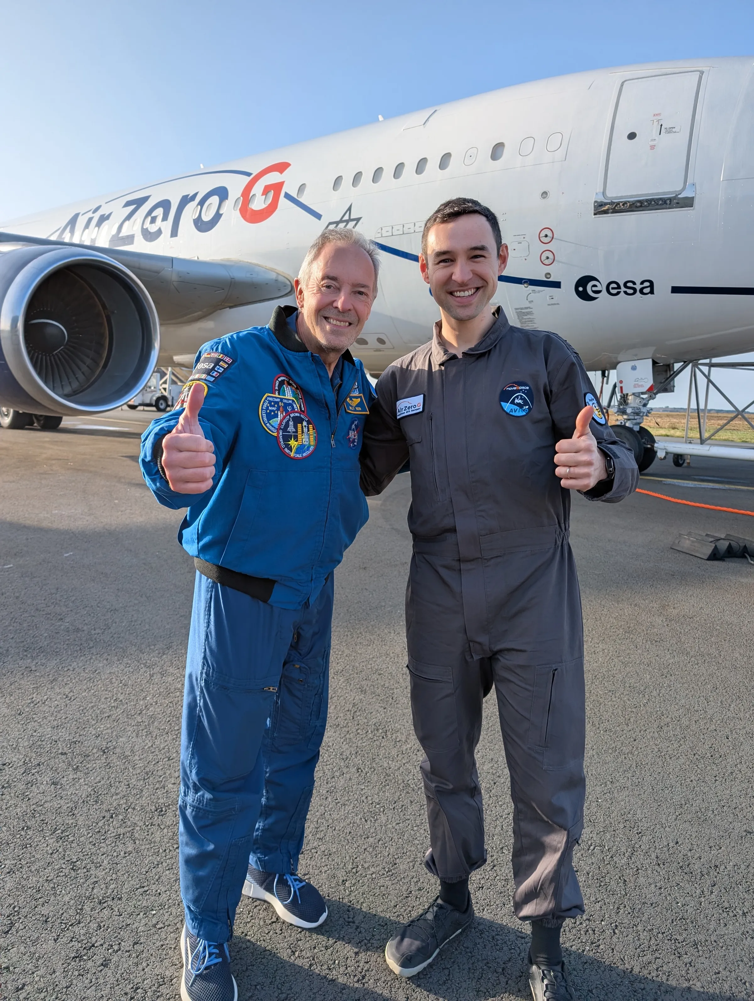 Jan standing next to the astronaut Jean-François Clervoy