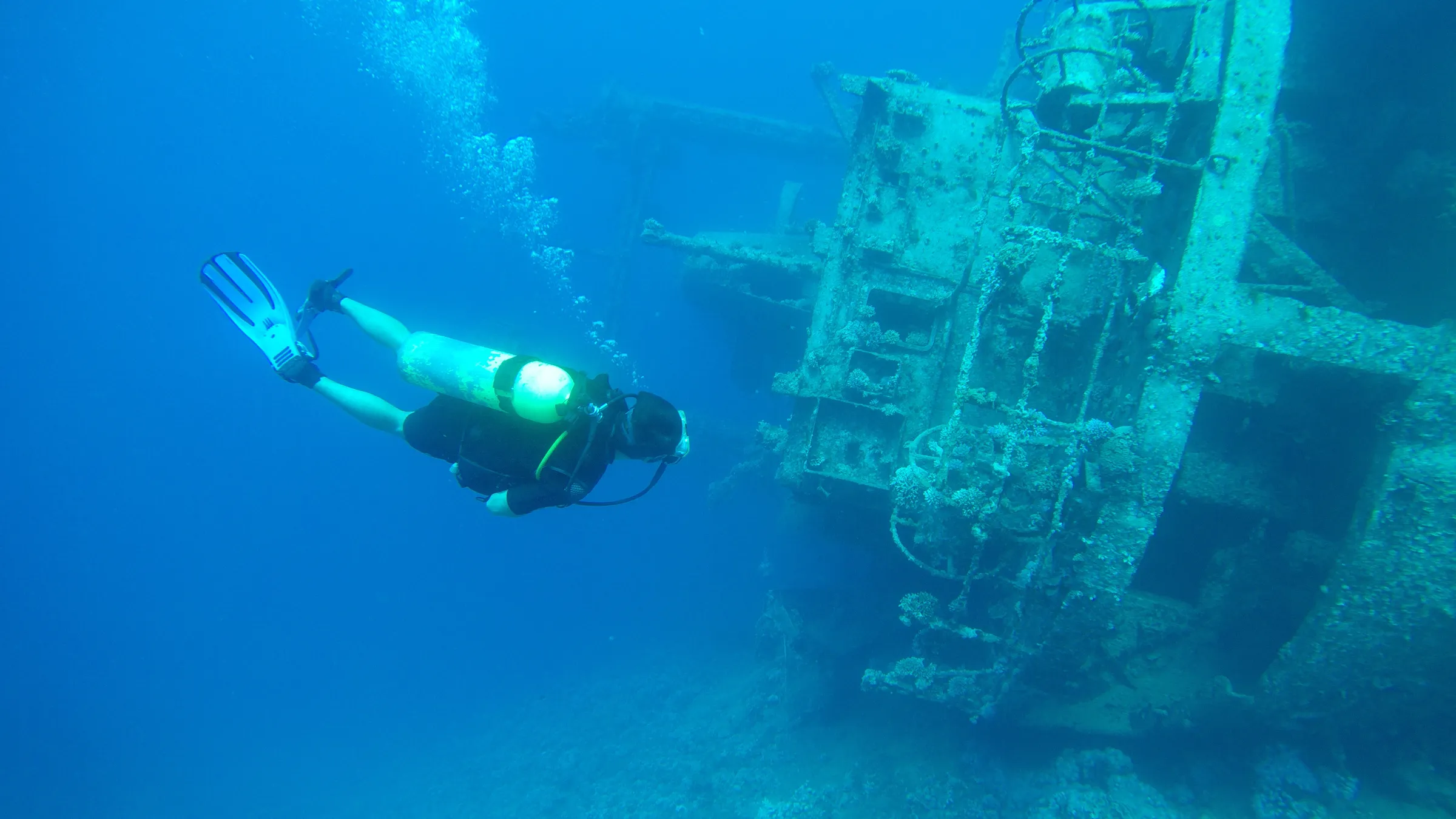 Jan scuba diving near a shipwreck