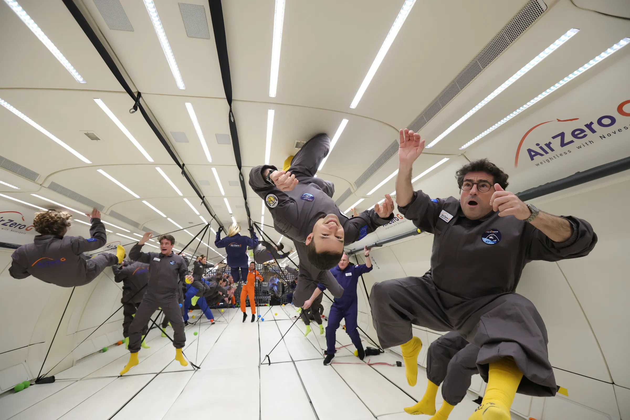 Jan floating upside down during a Zero-G flight