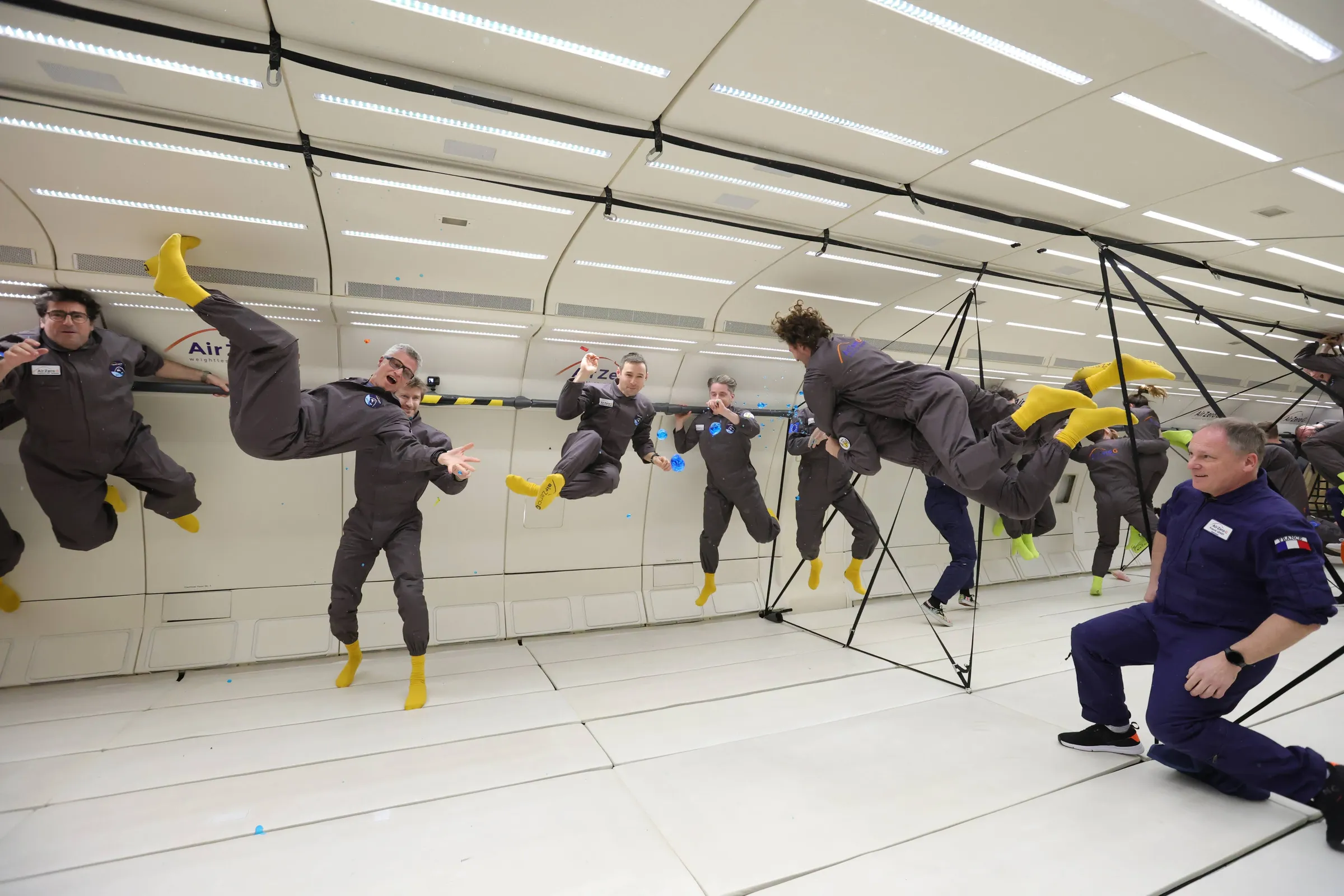 Jan catching water bubbles during a Zero-G flight